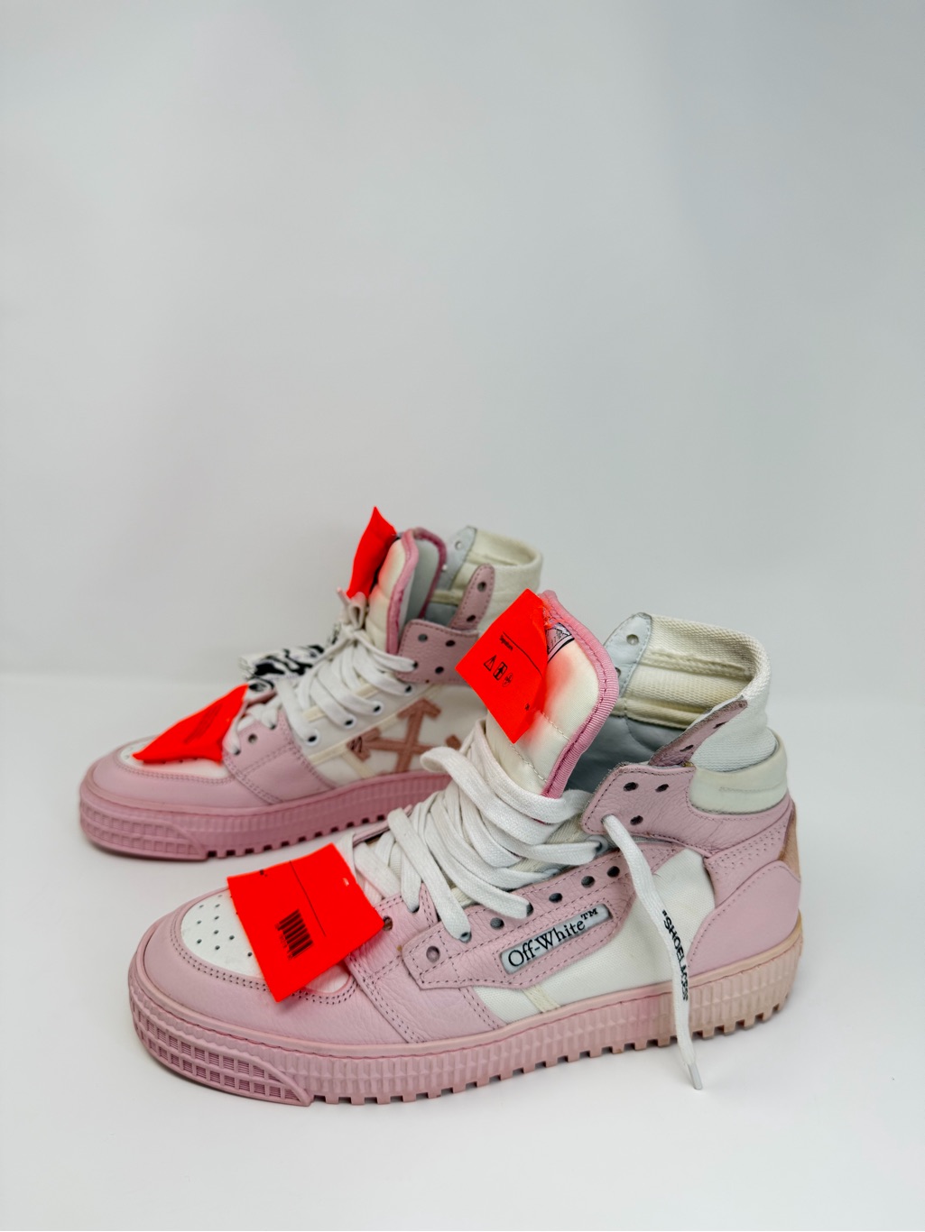 Off-White Pink And White High-Top Sneakers With Red Tags
